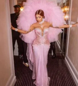Twists And Curves! Cardi B in 7 Hottest Dresses of All Times 6 Twists And Curves! Cardi B in 7 Hottest Dresses of All Times Cardi B Dress feathered pink dress
