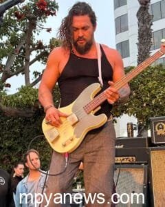 Jason Momoa Net Worth: playing guiter