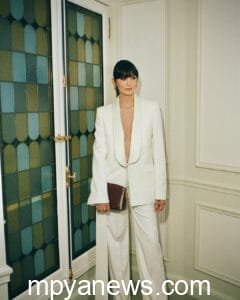 Nina Dobrev: on a white suit