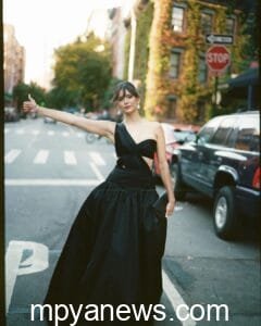 Nina Dobrev: on a black outfit dress