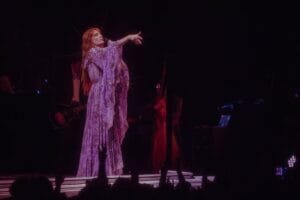 Florence Welch Facts: on a puple  dress