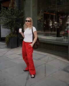 Tanya Burr Bio: on a  red, white outfit