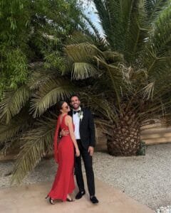 Lucy Watson Dress: on a red dress