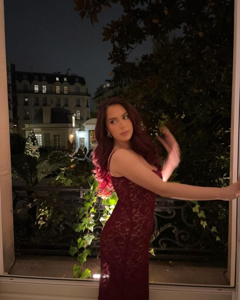Cinzia Baylis-Zullo Dress: in a maroon dress