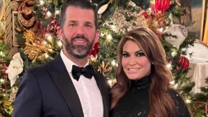 Donald Trump jr and Kimberly:in black