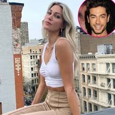 lexi sundin ebracing her white crop top