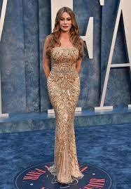 Sofia Vergara nude dresses:curvy and sassy