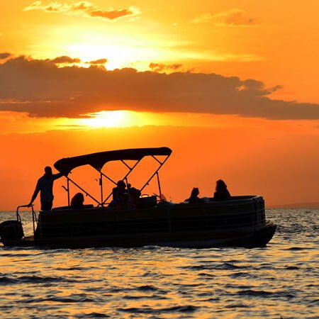 Vibrant Sunset Colors Over Lake Victoria Fishing Boats:breath taking view