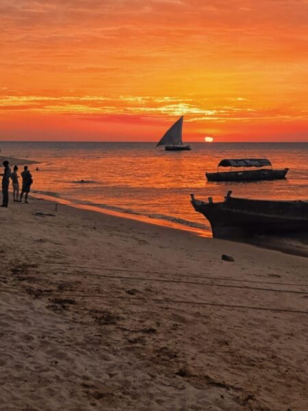 Crimson skies frame the boats in perfect balance:perfect relaxing view