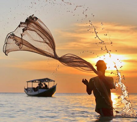 Vibrant Sunset Colors Over Lake Victoria Fishing Boats:watchs as day descendes as night ascends